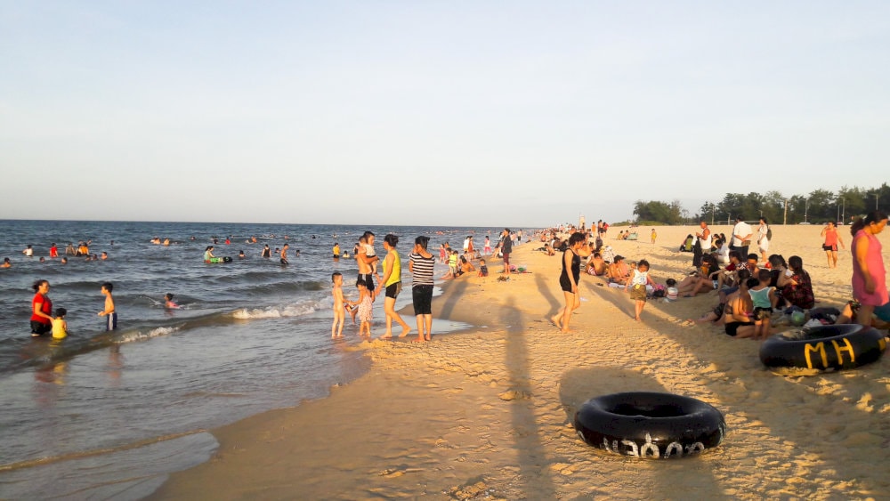 Swimming at Thuan An beach offers a refreshing escape in calm, clear waters, surrounded by the tranquil beauty of central Vietnam’s coastline